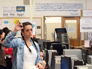 Franklin High School freshman Bria Dixson waits her turn to ask a question during a career panel on Law, Law Enforcement and Public Service.